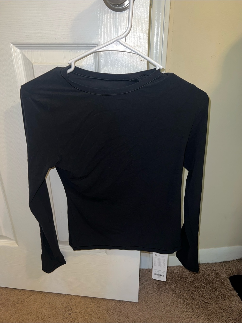 Black athletic long sleeve top